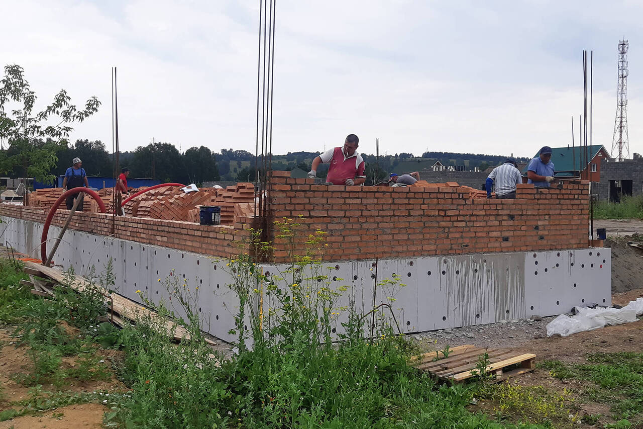 Строительство стен для дома из кирпича
